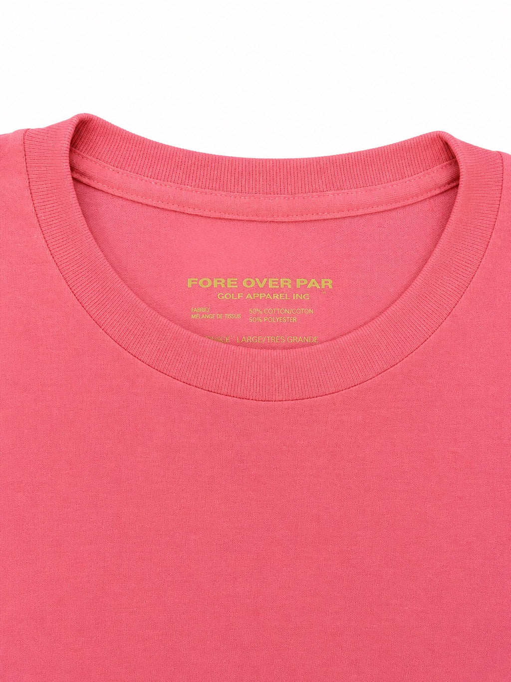Close-up of a pink crewneck t-shirt showing the inner neck label with yellow-green text that reads 'FORE OVER PAR'.